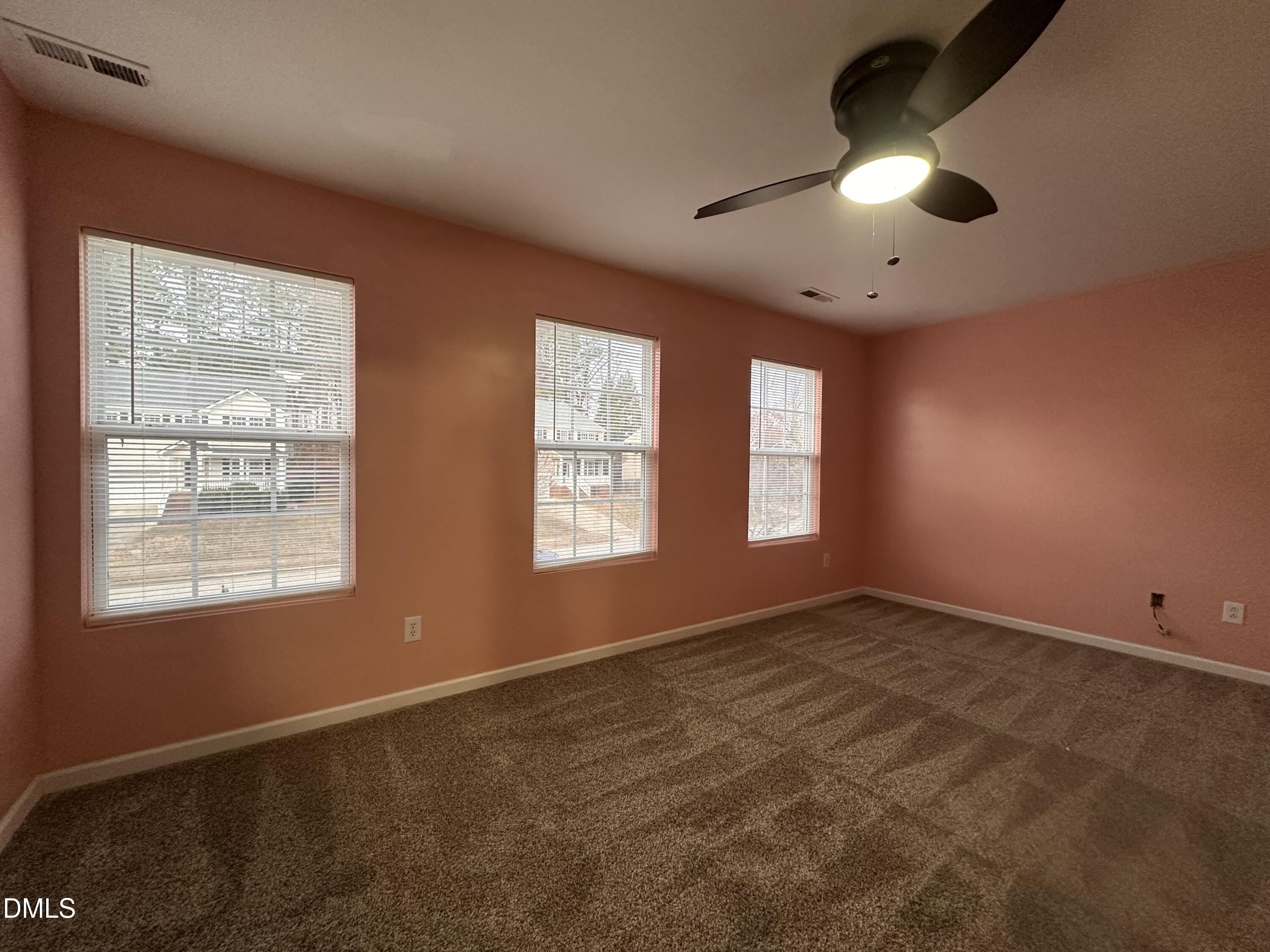 1220 Arbor Greene Drive Garner, NC 27529 - Photo 16 of 17 a view of an empty room with a window