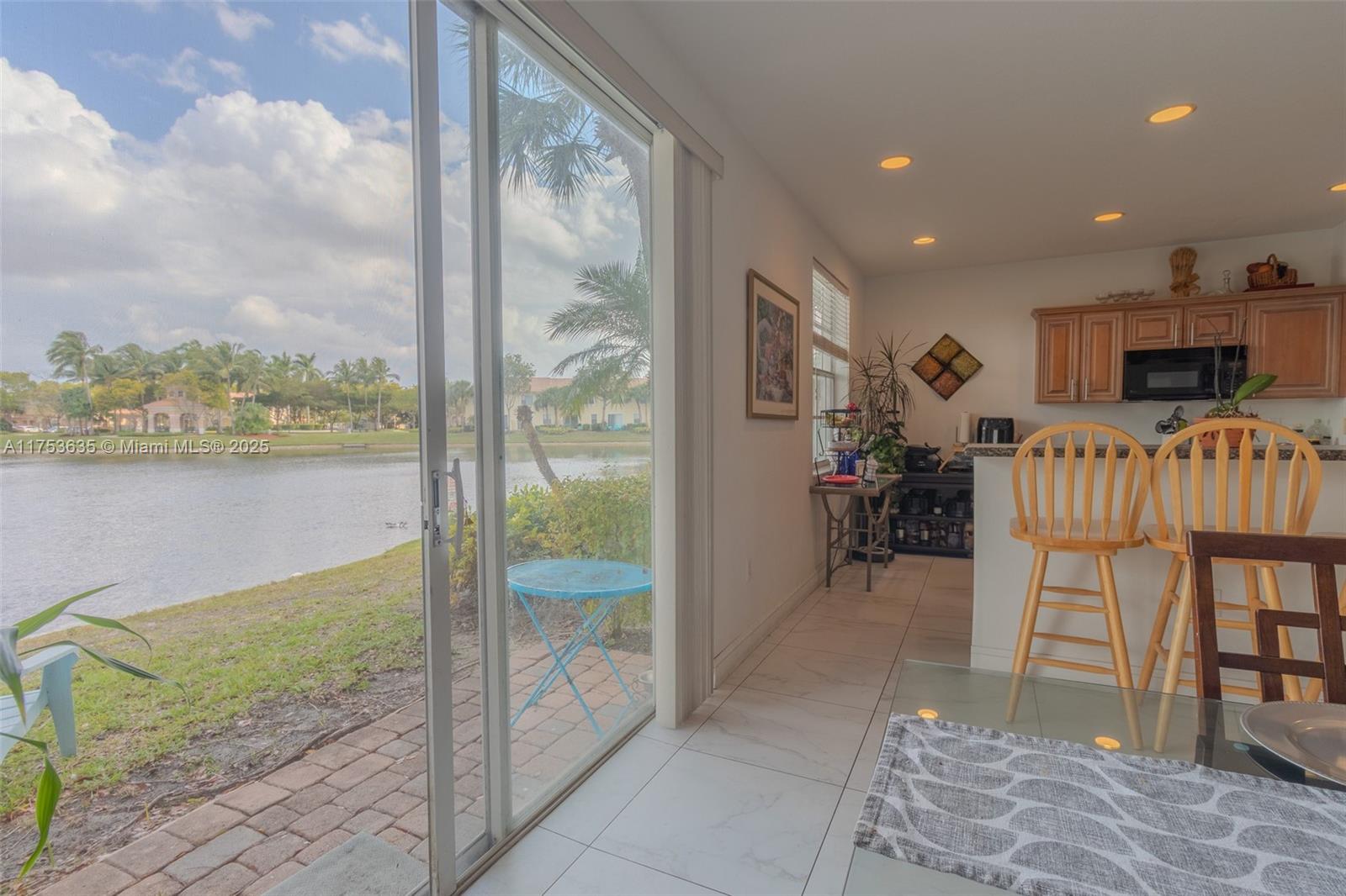 2695 Southwest 84th Terrace, Unit 104 Miramar, FL 33025 - Photo 19 of 36 a very nice looking room with a large window