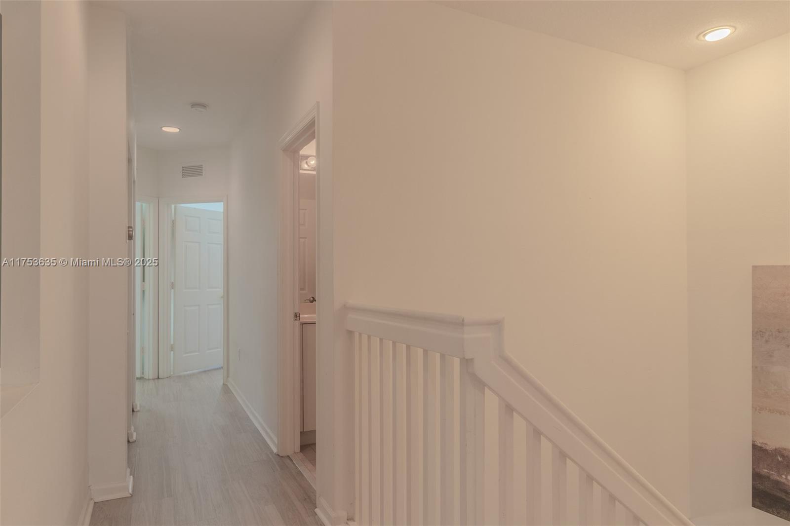 2695 Southwest 84th Terrace, Unit 104 Miramar, FL 33025 - Photo 22 of 36 a view of a hallway