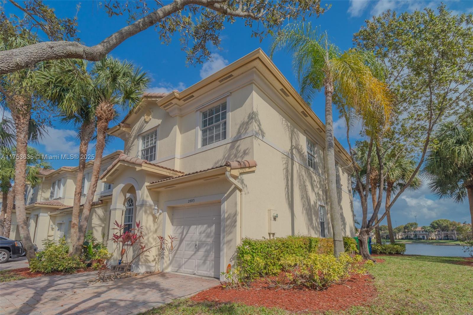 2695 Southwest 84th Terrace, Unit 104 Miramar, FL 33025 - Photo 3 of 36 a view of a house with a yard