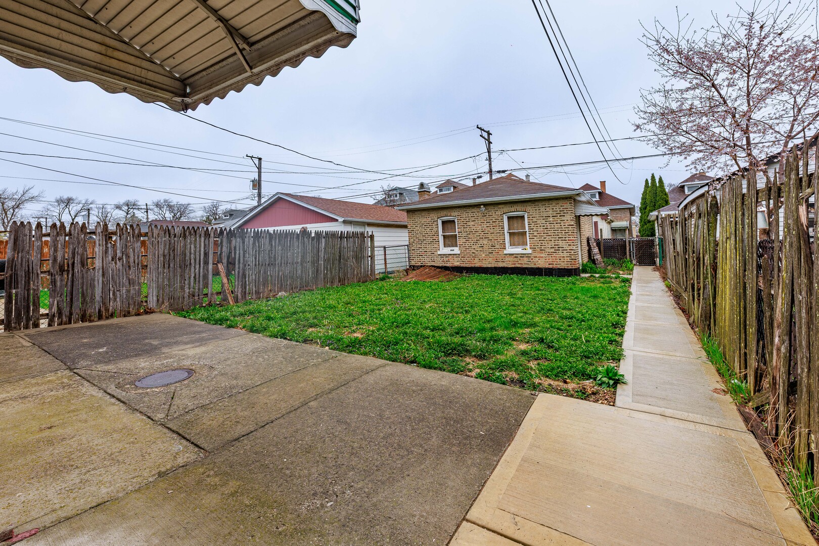 4941 South Kolin Avenue Chicago, IL 60632 - Photo 14 of 17 a front view of a house with yard