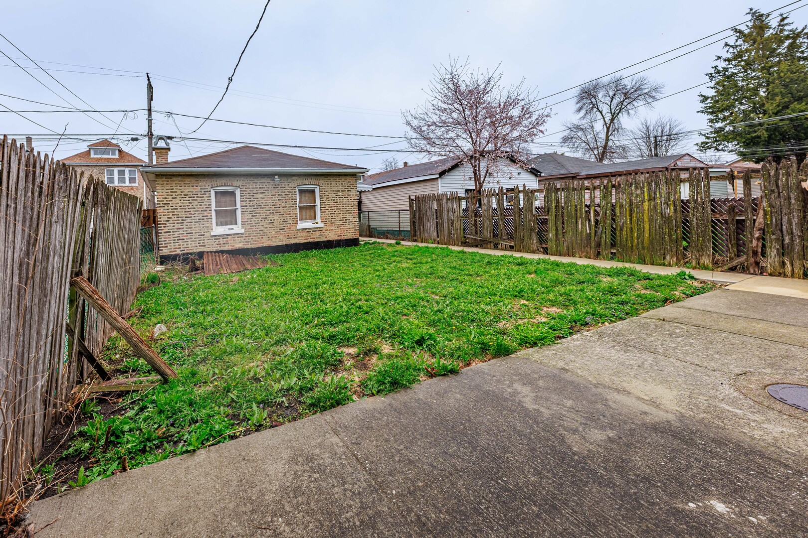 4941 South Kolin Avenue Chicago, IL 60632 - Photo 15 of 17 a front view of a house with garden