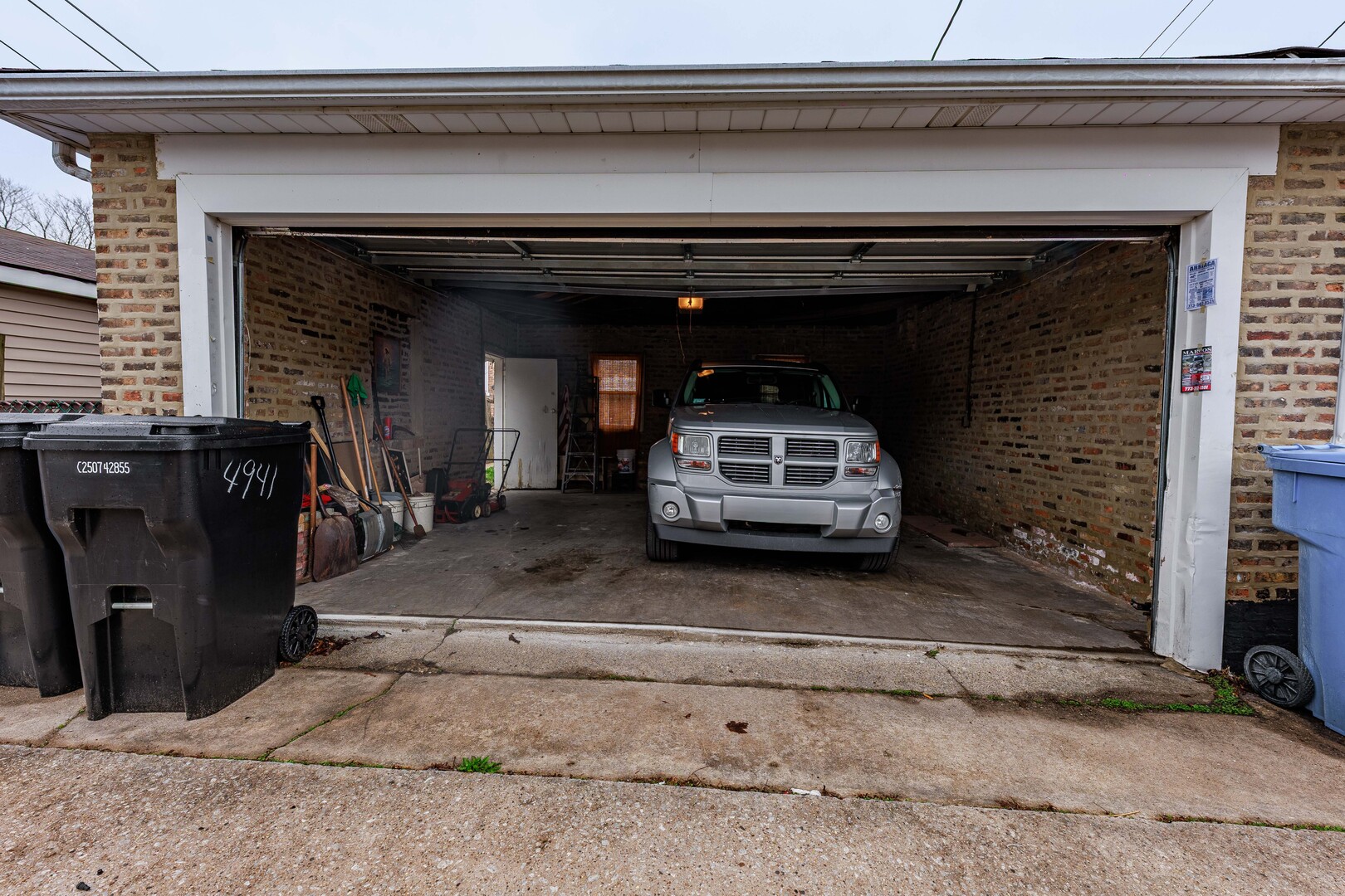 4941 South Kolin Avenue Chicago, IL 60632 - Photo 17 of 17 a car parked in a parking space