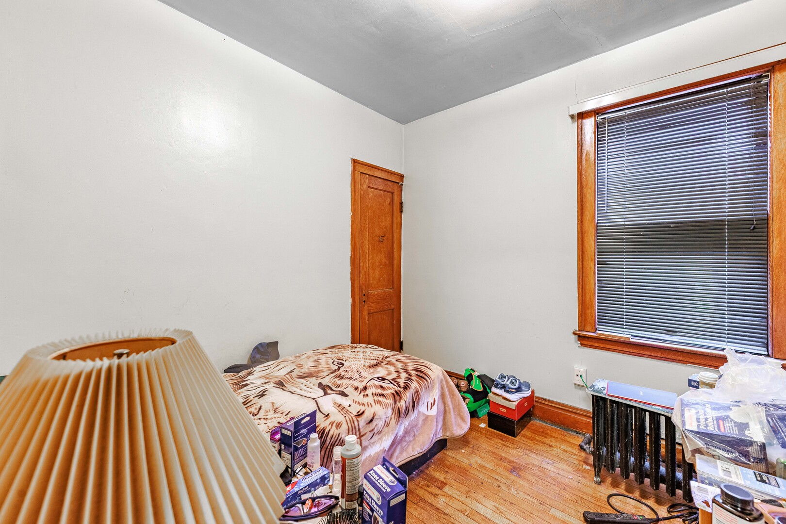 4941 South Kolin Avenue Chicago, IL 60632 - Photo 5 of 17 a bedroom with a bed and a window