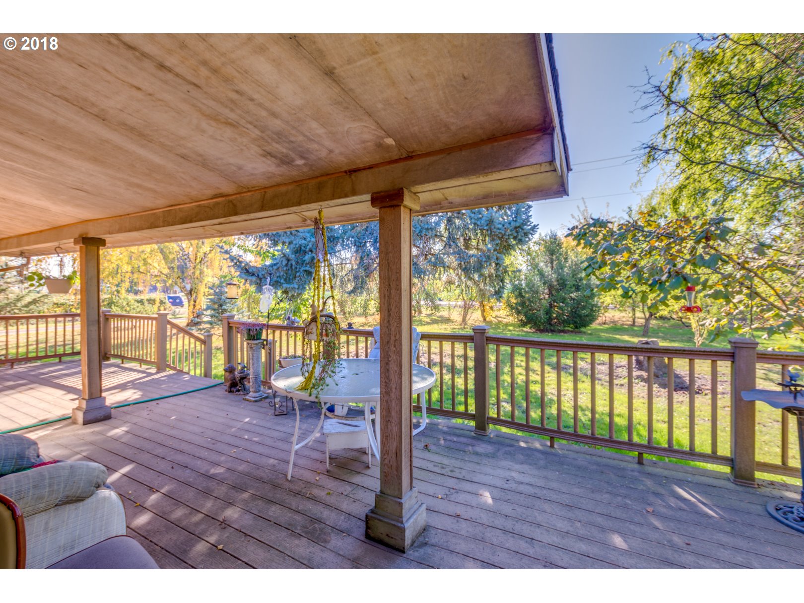 14297 Dominic Road Northeast Mount Angel, OR 97362 - Photo 12 of 32 a view of a porch with wooden floor