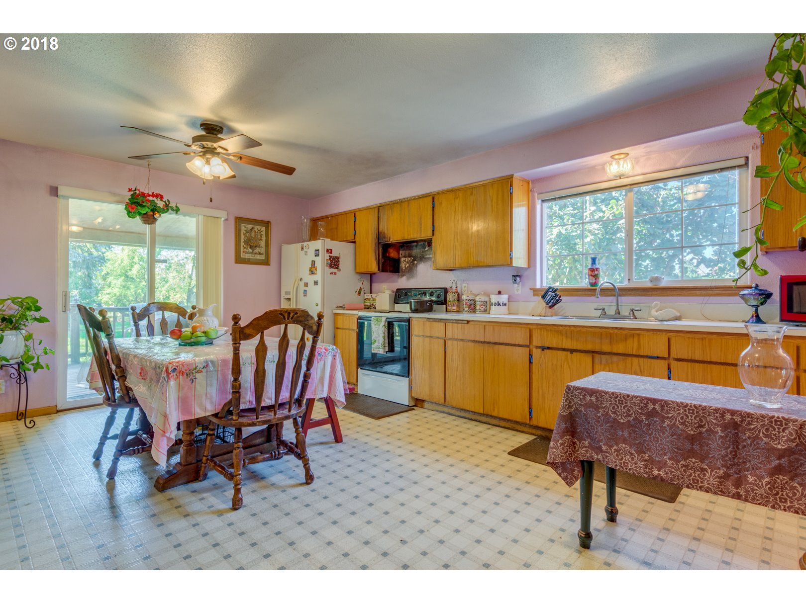 14297 Dominic Road Northeast Mount Angel, OR 97362 - Photo 15 of 32 a dining room with furniture and a large window