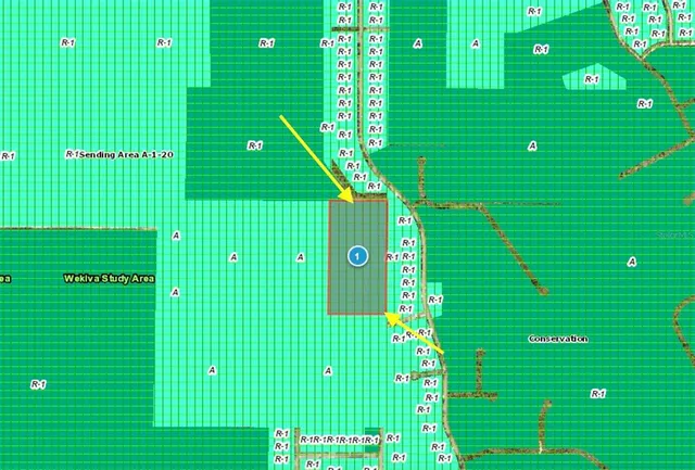 a living room with a couch and a table with wooden floor