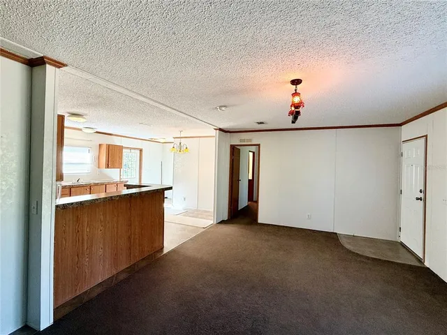 a view of a hallway with closet area