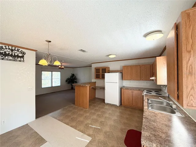 a view of a bathroom from a hallway