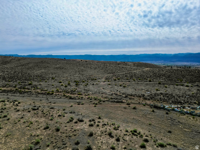 600 East E Street Moroni, UT 84646 - Photo 9 of 38 Expansive undeveloped land featuring rolling hills and distant mountain ranges