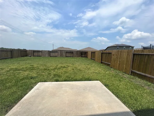a view of a backyard with a garden
