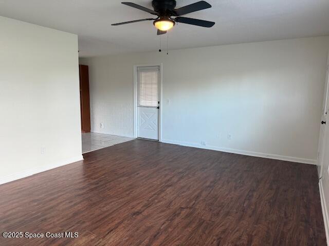 1043 Jersey Street Cocoa, FL 32927 - Photo 4 of 16 a view of empty room with wooden floor