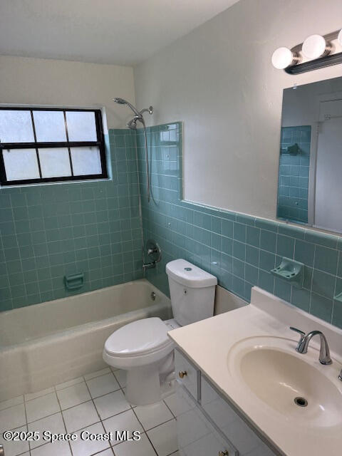 1043 Jersey Street Cocoa, FL 32927 - Photo 9 of 16 a bathroom with a sink a toilet and shower