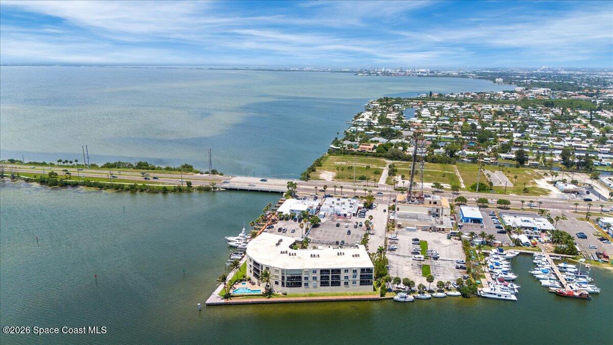4125 West End Road, Unit 405 Cocoa Beach, FL 32931 - Photo 38 of 44 a view of a lake with a city