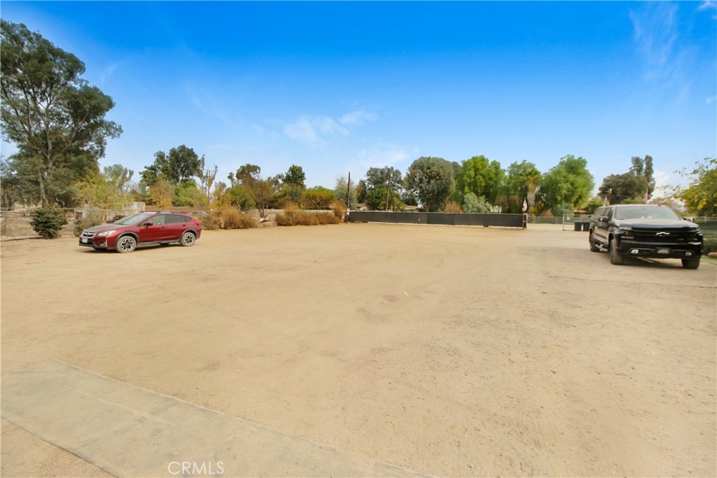 30645 Old Windmill Road Menifee, CA 92584 - Photo 11 of 12 a view of a street with cars parked