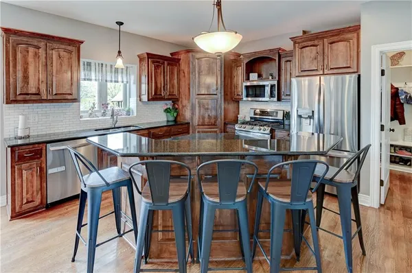 $610,000 | 500 Northeast Woodpark Lane, Lee's Summit, MO 64086