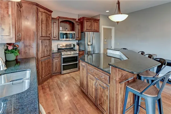 $610,000 | 500 Northeast Woodpark Lane, Lee's Summit, MO 64086