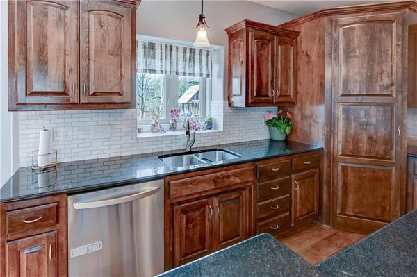 $610,000 | 500 Northeast Woodpark Lane, Lee's Summit, MO 64086