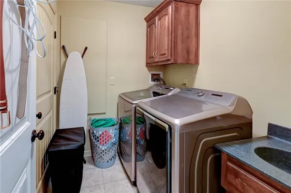 $610,000 | 500 Northeast Woodpark Lane, Lee's Summit, MO 64086