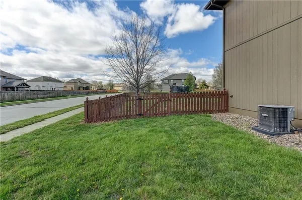 $610,000 | 500 Northeast Woodpark Lane, Lee's Summit, MO 64086