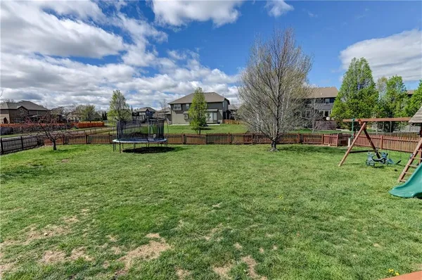 $610,000 | 500 Northeast Woodpark Lane, Lee's Summit, MO 64086