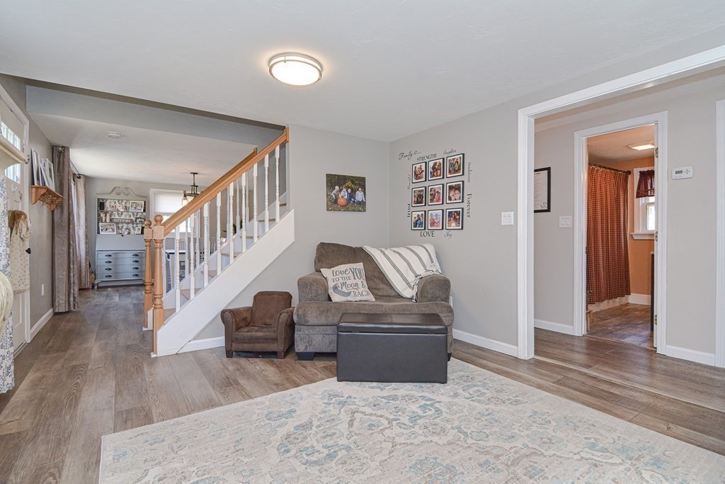37 Hough Road Sutton, MA 01590 - Photo 18 of 40 a living room with furniture and a rug