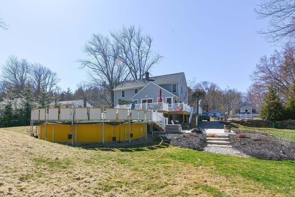 37 Hough Road Sutton, MA 01590 - Photo 35 of 40 a view of a house with swimming pool and sitting area