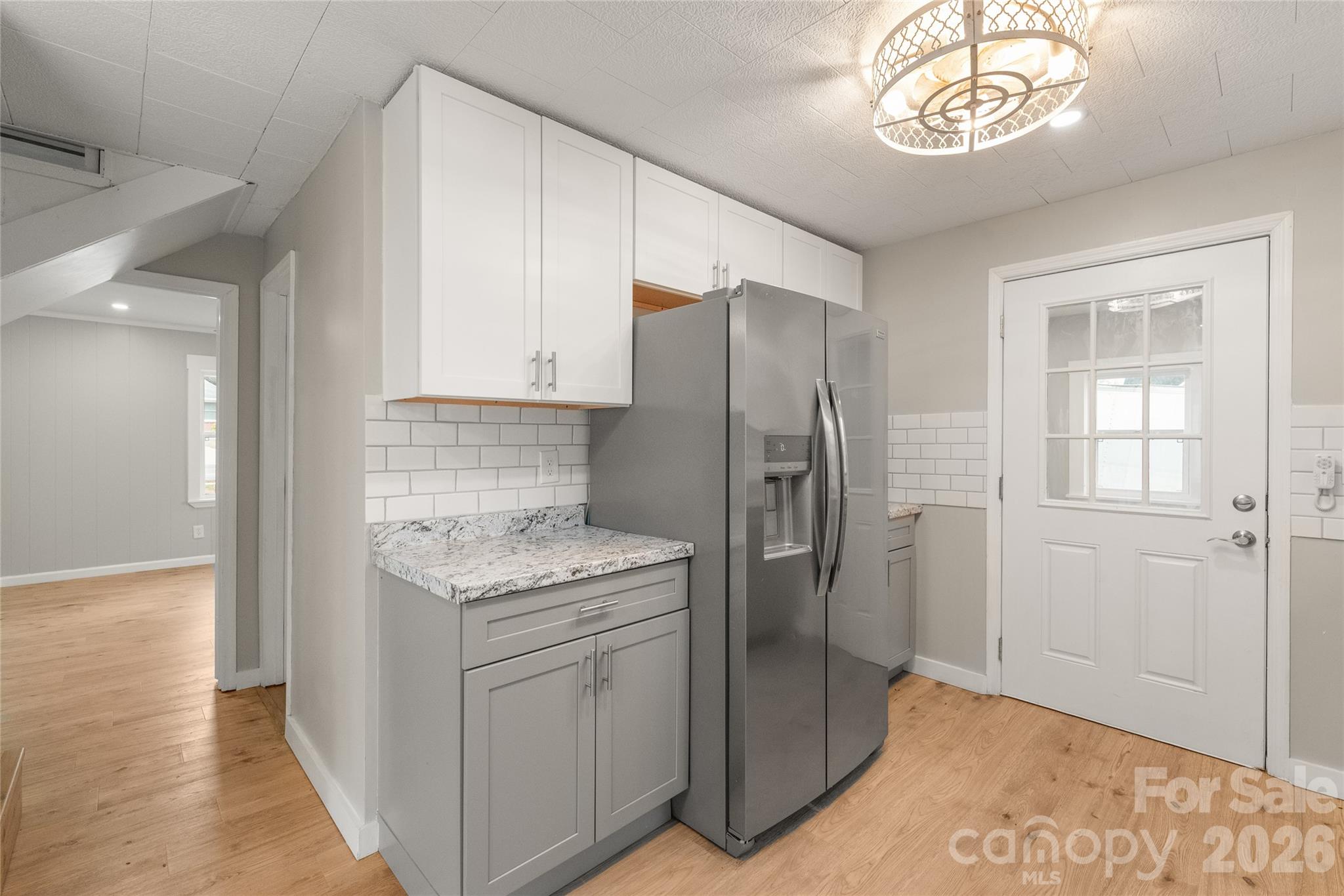 321 South Myrtle School Road Gastonia, NC 28052 - Photo 16 of 34 a kitchen with a refrigerator and a sink