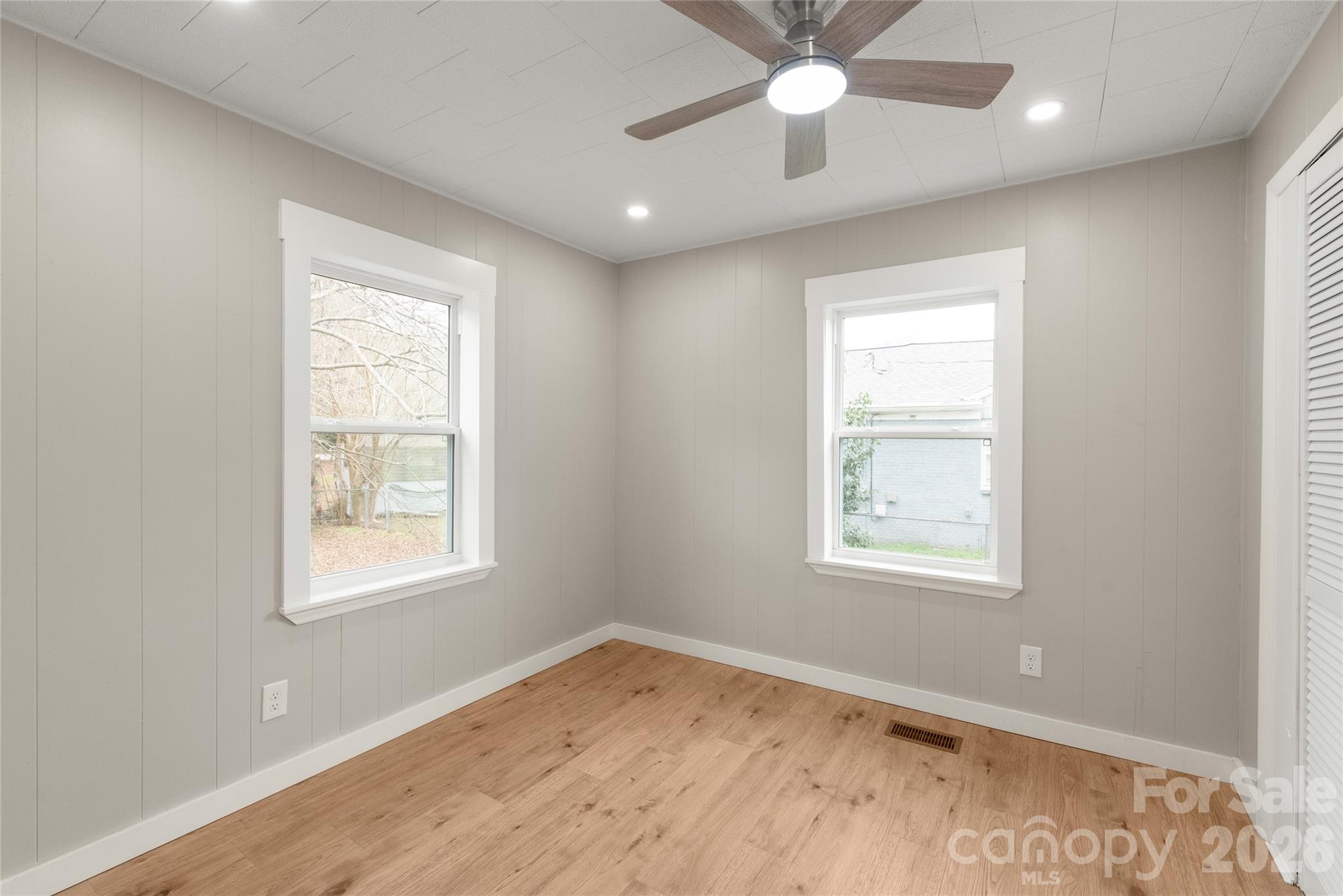 321 South Myrtle School Road Gastonia, NC 28052 - Photo 17 of 34 an empty room with a window and a fan