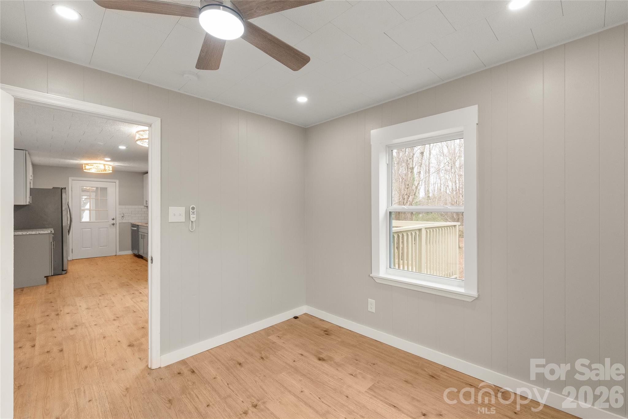 321 South Myrtle School Road Gastonia, NC 28052 - Photo 18 of 34 en empty room with windows and ceiling fan