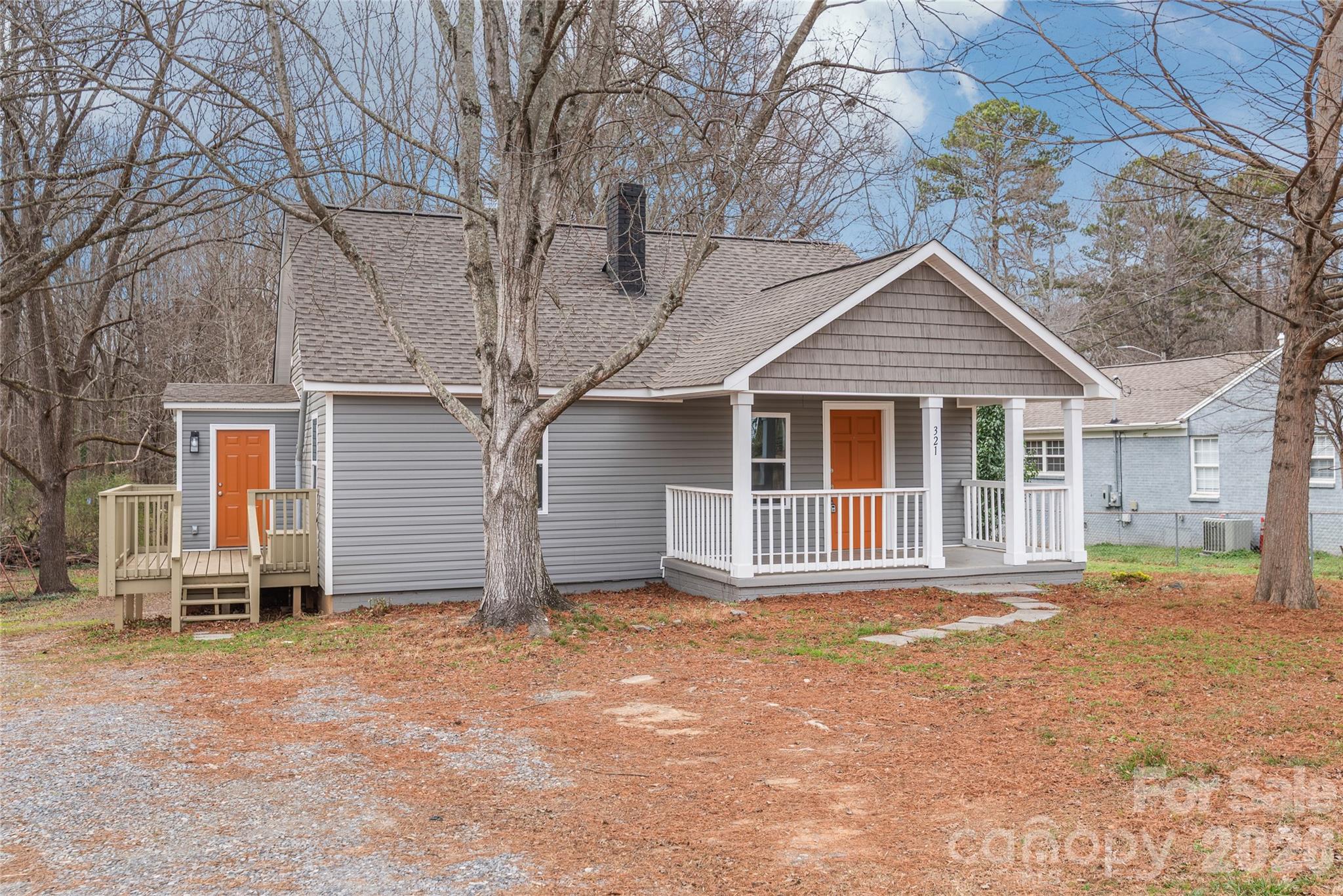 321 South Myrtle School Road Gastonia, NC 28052 - Photo 2 of 34 front view of a house with a yard