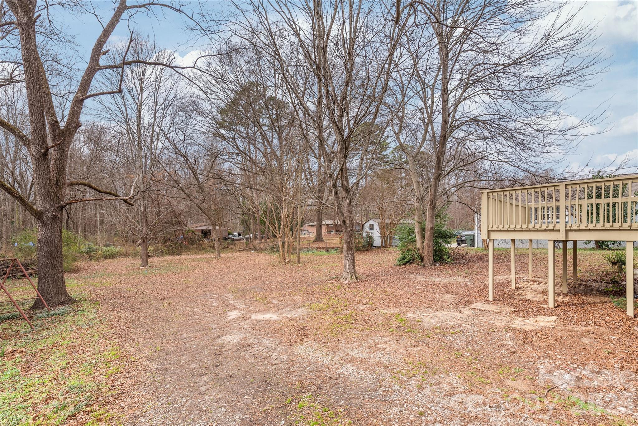321 South Myrtle School Road Gastonia, NC 28052 - Photo 29 of 34 a backyard of a house with lots of green space