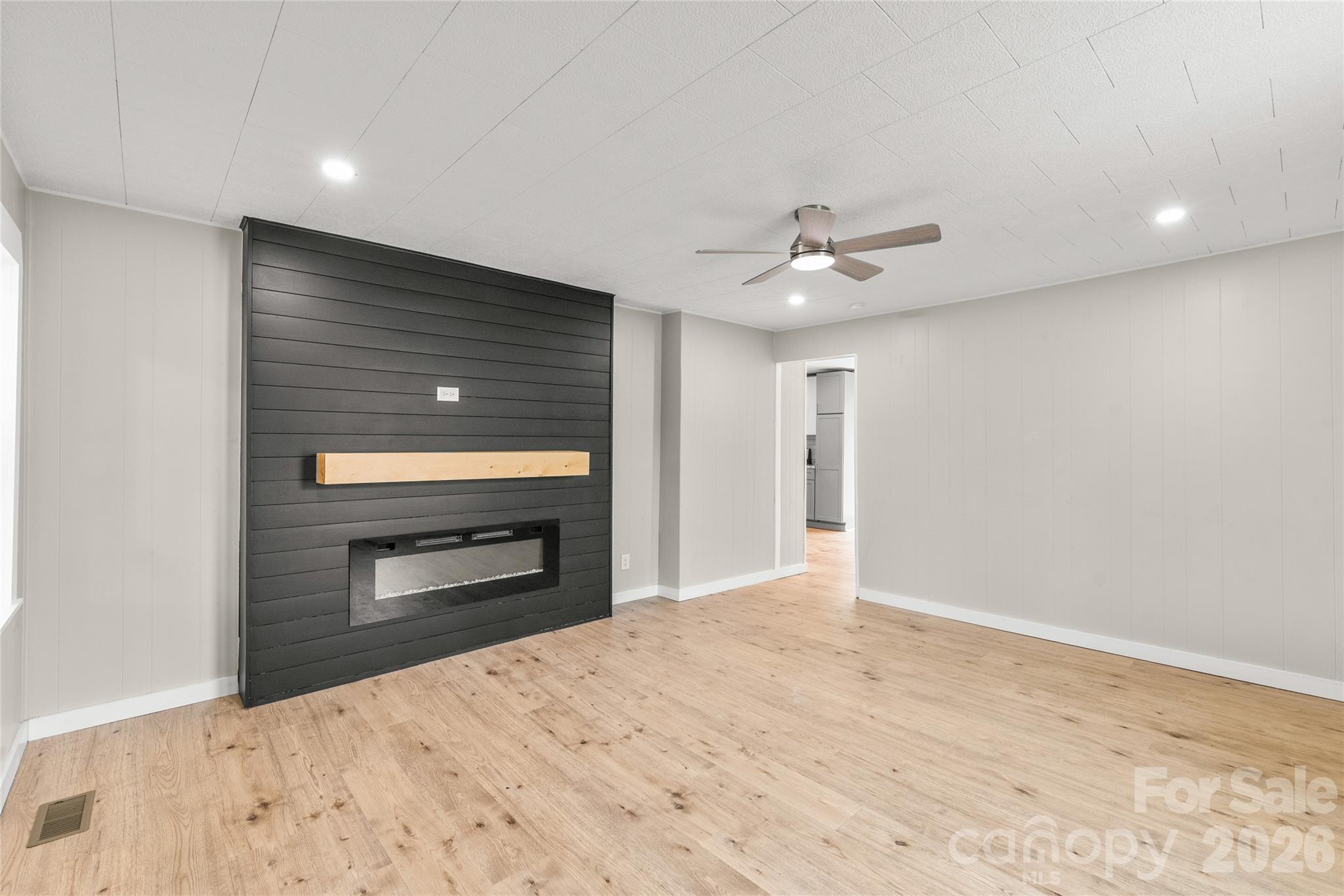 321 South Myrtle School Road Gastonia, NC 28052 - Photo 3 of 34 a view of empty room with a ceiling fan and window