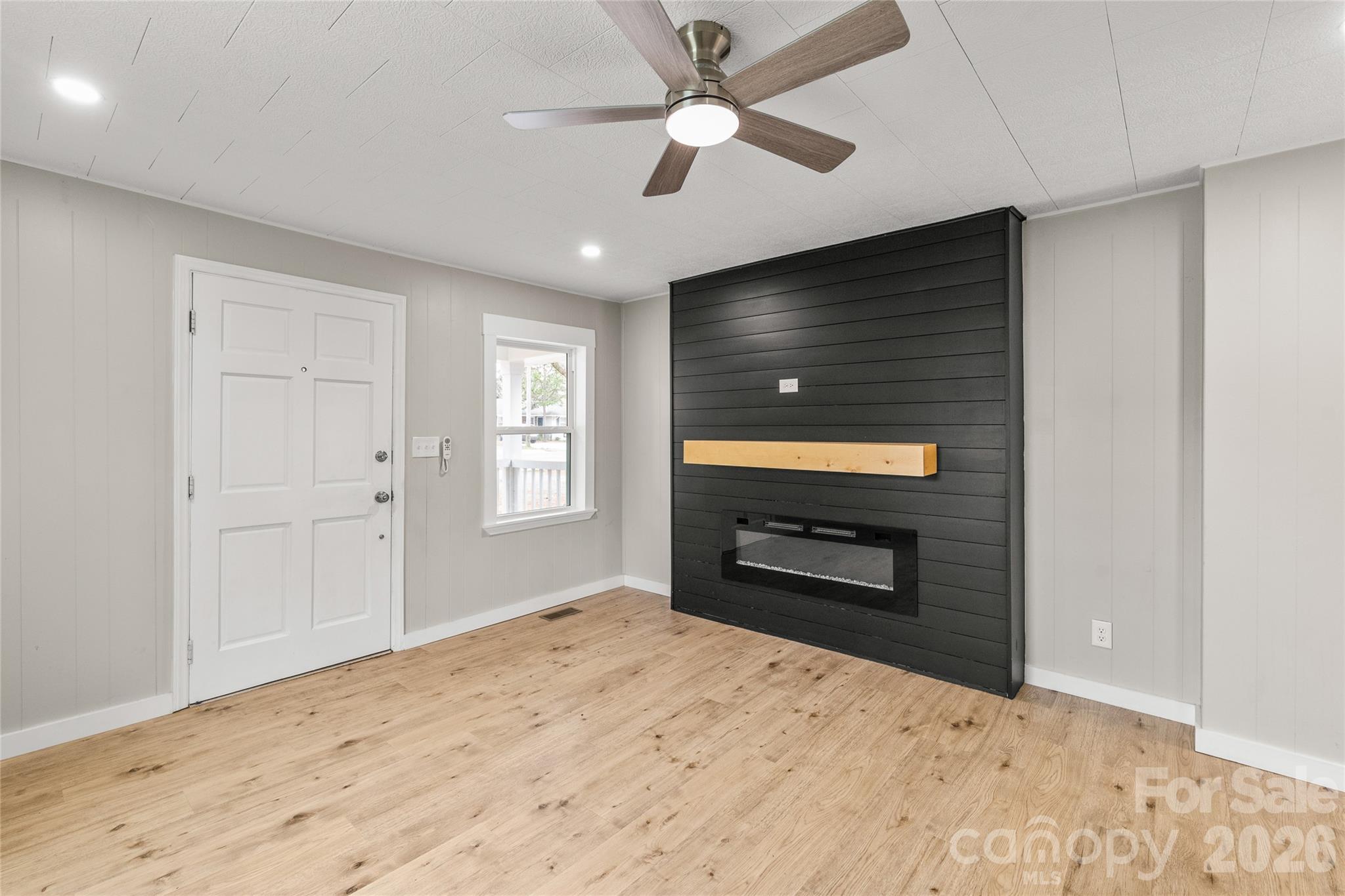 321 South Myrtle School Road Gastonia, NC 28052 - Photo 10 of 34 a bedroom with a bed and a flat screen tv