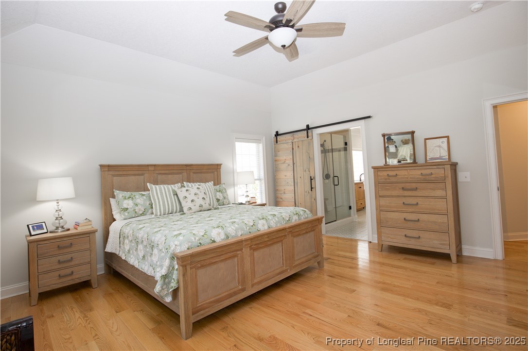 775 Connell Road Carthage, NC 28327 - Photo 14 of 50 a bedroom with a bed and dresser