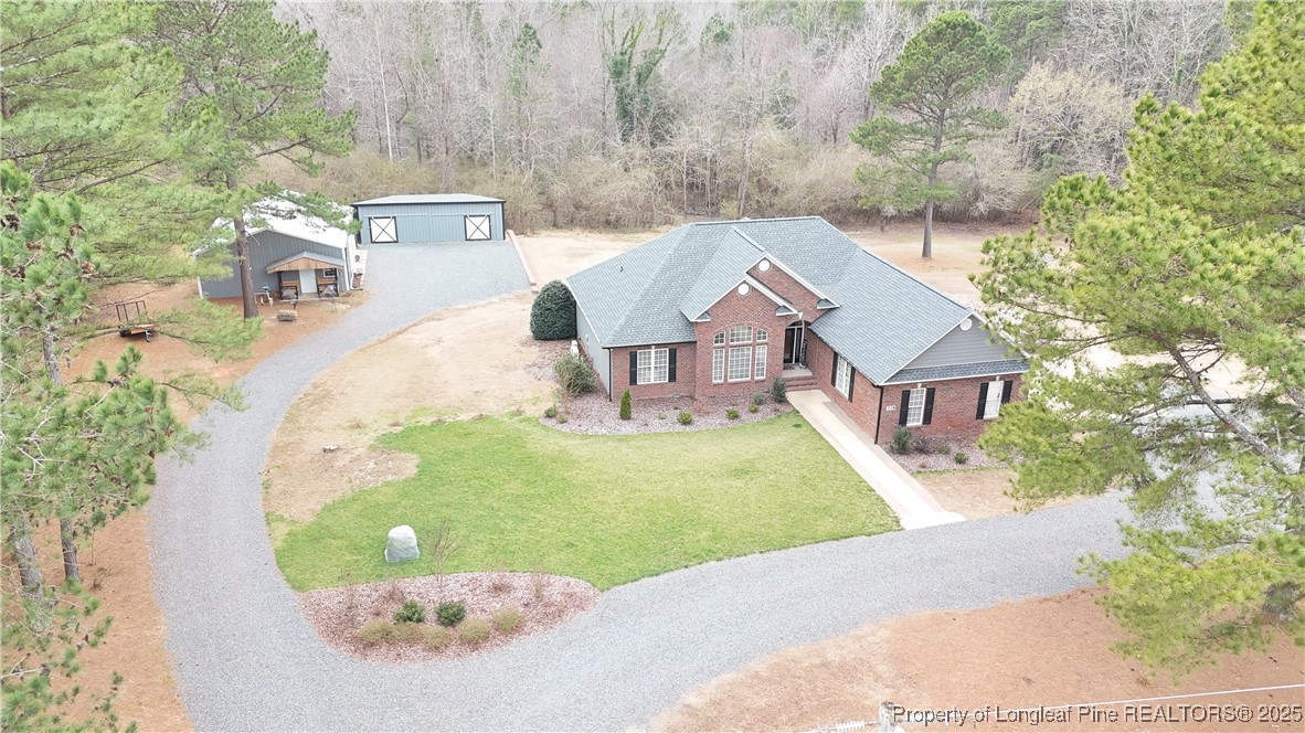 775 Connell Road Carthage, NC 28327 - Photo 3 of 50 an aerial view of a house