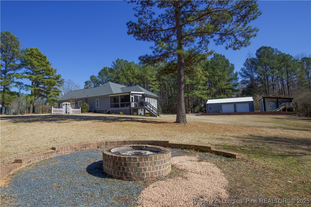 775 Connell Road Carthage, NC 28327 - Photo 34 of 50 a front view of a house with swimming pool