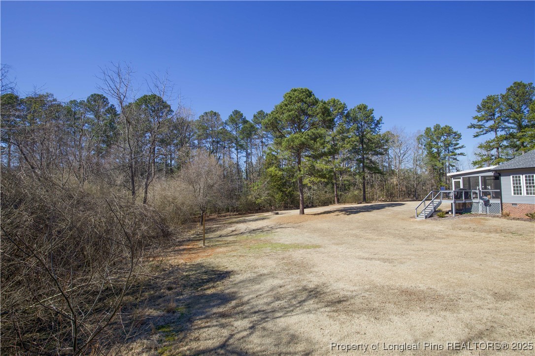 775 Connell Road Carthage, NC 28327 - Photo 35 of 50 a view of a backyard of a house