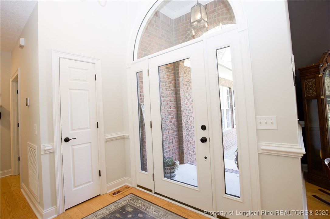 775 Connell Road Carthage, NC 28327 - Photo 5 of 50 a view of a hallway with wooden floor and entryway