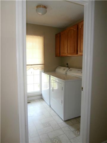738 Doak Road Manchester, TN 37355 - Photo 3 of 13 Utility room, washer and dryer stay.