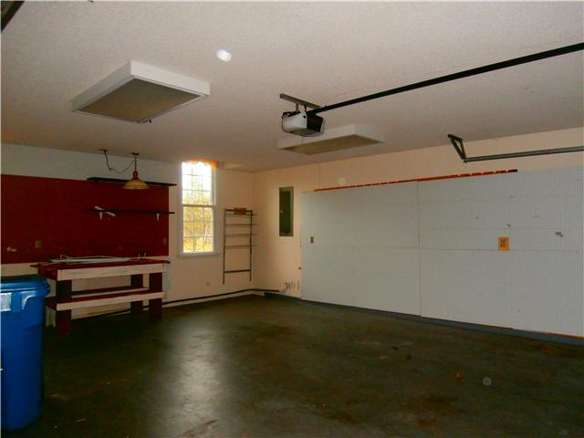 738 Doak Road Manchester, TN 37355 - Photo 6 of 13 Another view of garage and workbench..
