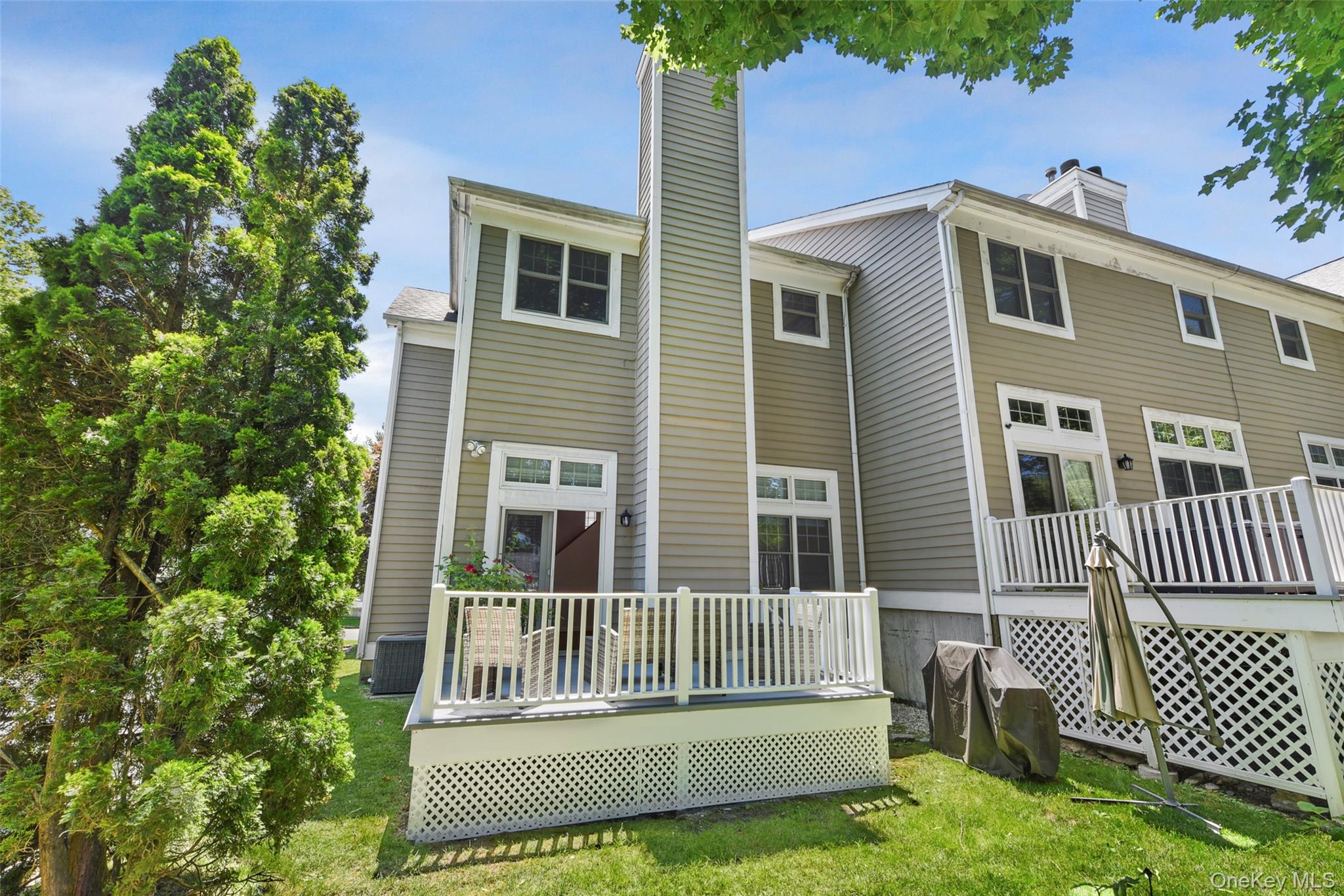 21 Brookridge Court Rye Brook, NY 10573 - Photo 20 of 20 Private back deck, perfect for relaxing or entertaining.