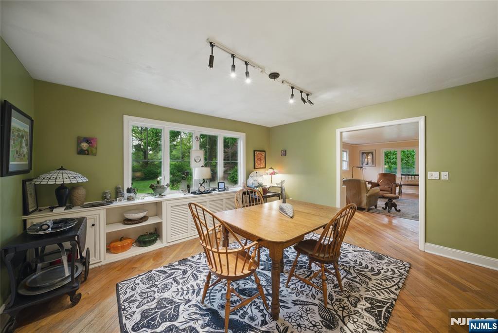 351 Franklin Road Denville, NJ 07834 - Photo 11 of 45 a outdoor space with furniture lots of dining room and wooden floor