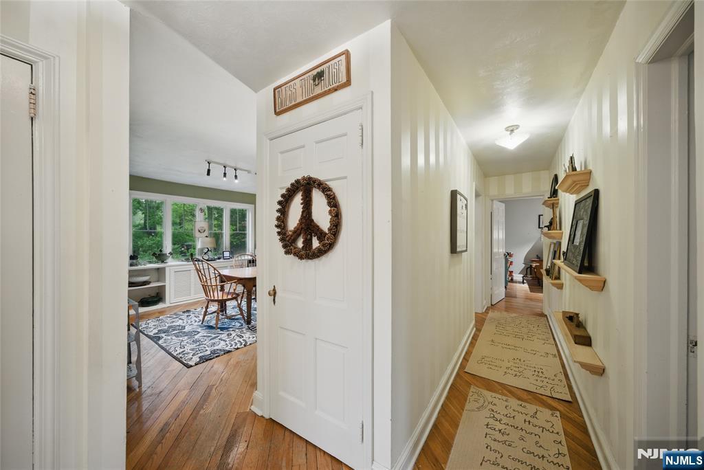 351 Franklin Road Denville, NJ 07834 - Photo 20 of 45 a hallway with a view of living room