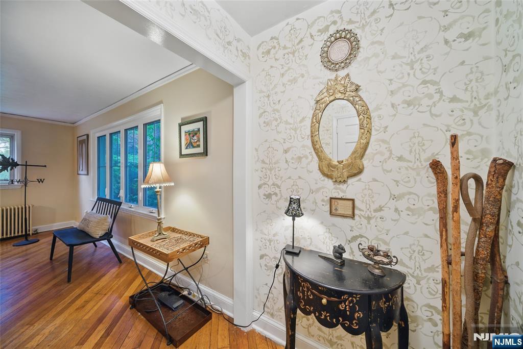 351 Franklin Road Denville, NJ 07834 - Photo 2 of 45 a living room with furniture a table and wooden floor