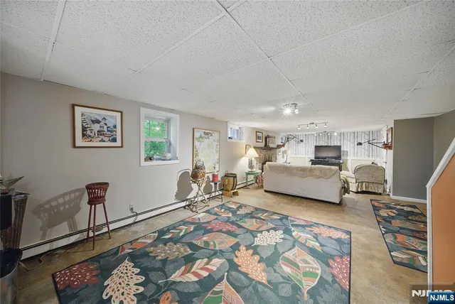 a bed room with furniture and a window