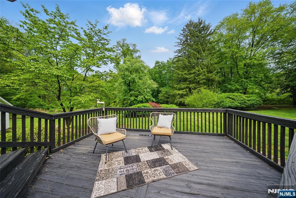 351 Franklin Road Denville, NJ 07834 - Photo 38 of 45 a view of a deck with a chair
