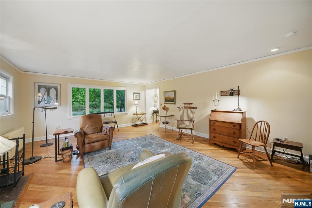 351 Franklin Road Denville, NJ 07834 - Photo 6 of 45 a living room with furniture and a wooden floor