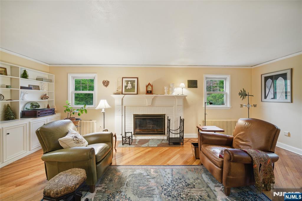 351 Franklin Road Denville, NJ 07834 - Photo 7 of 45 a living room with furniture and a fireplace