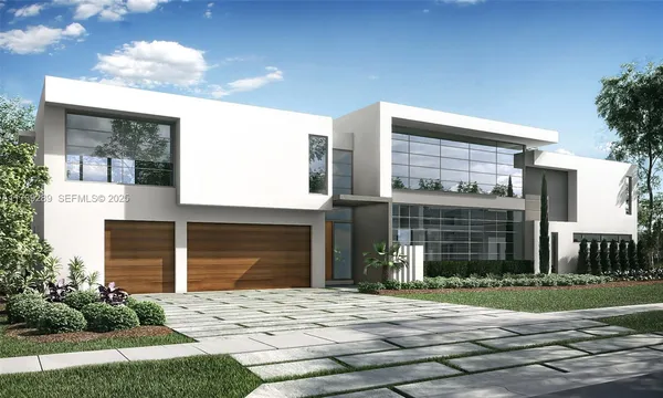 a front view of a house with a yard table and chairs